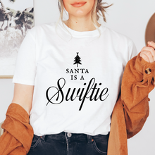Cargar imagen en el visor de la galería, Santa is a Swiftie Playera