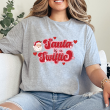 Cargar imagen en el visor de la galería, Santa is a Swiftie RED Playera
